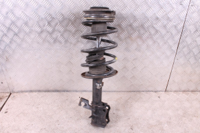 Амортизатор передний левый